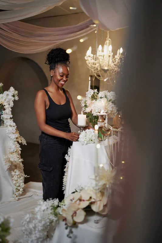 A styled event in the venue with florals and a chandelier